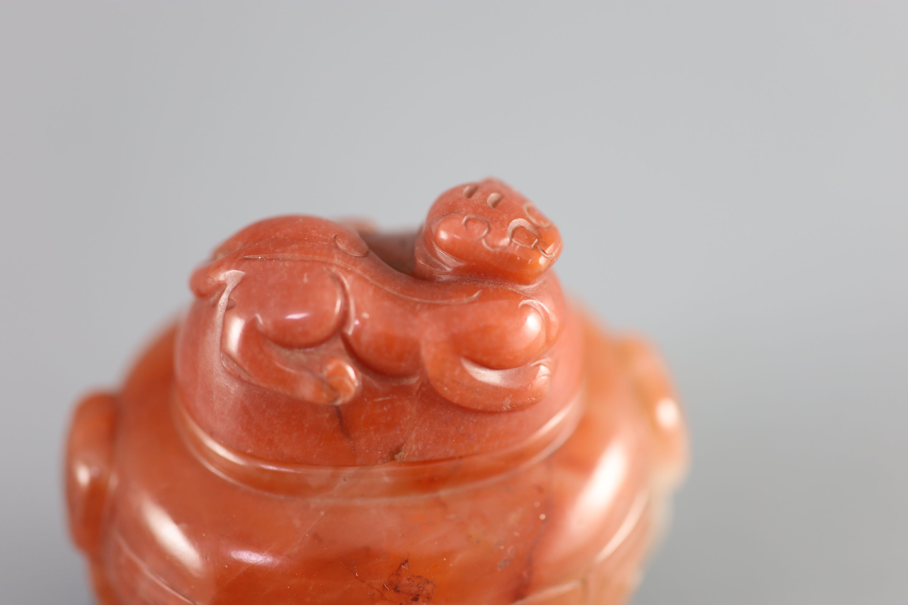 A small Chinese cornelian jar and cover, Qing dynasty, 18th/19th century, height 2.5in.